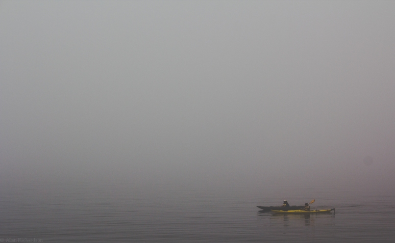 Kayakers in fog
